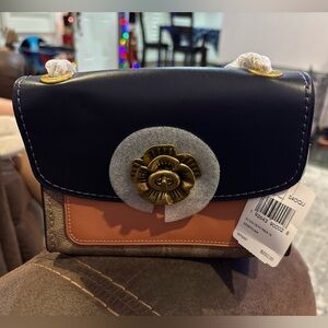 Coach Navy and Tan Mini Bag with Gold Flower Accent